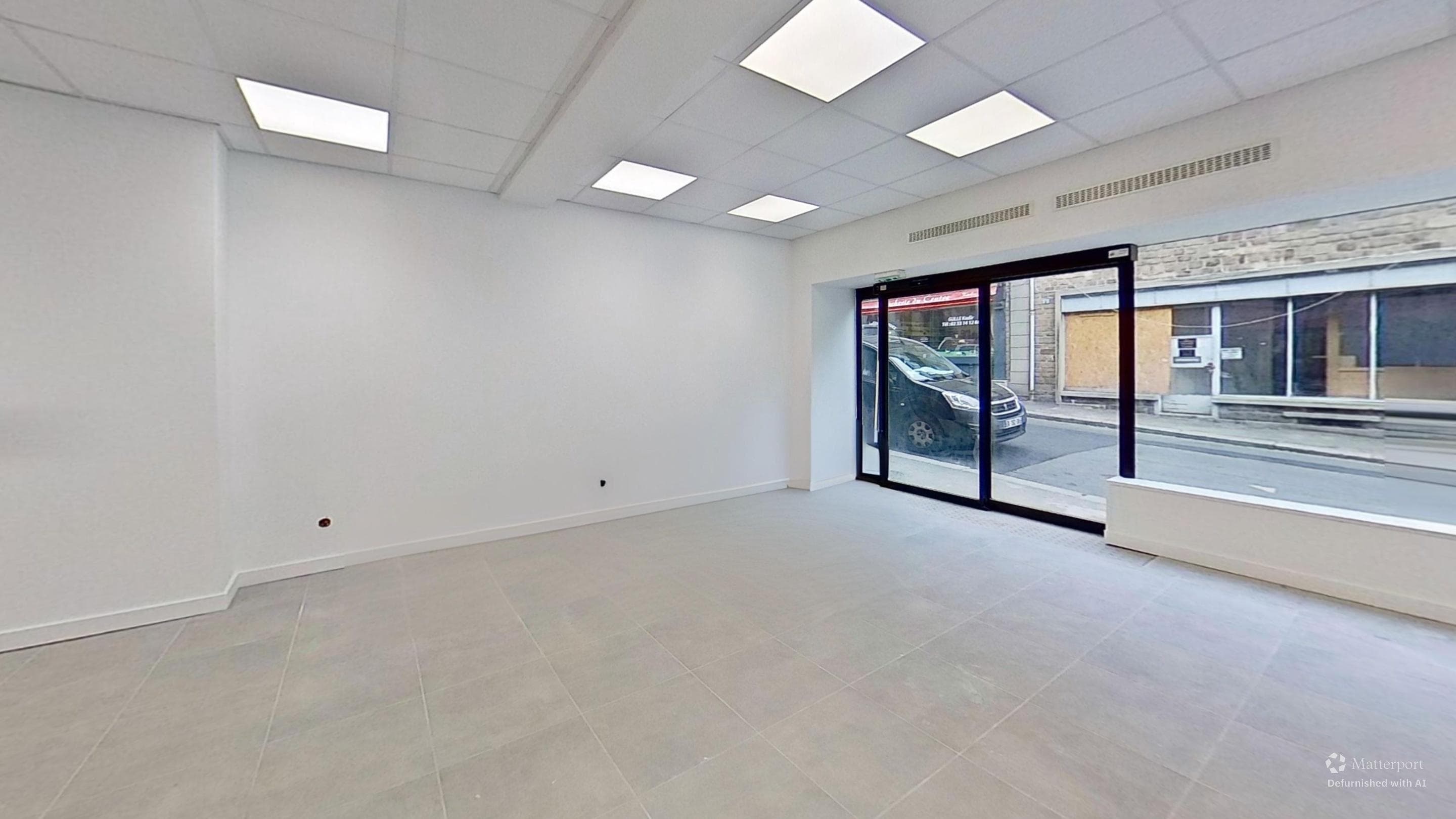 Vue immobilière du bâtiment - image 2